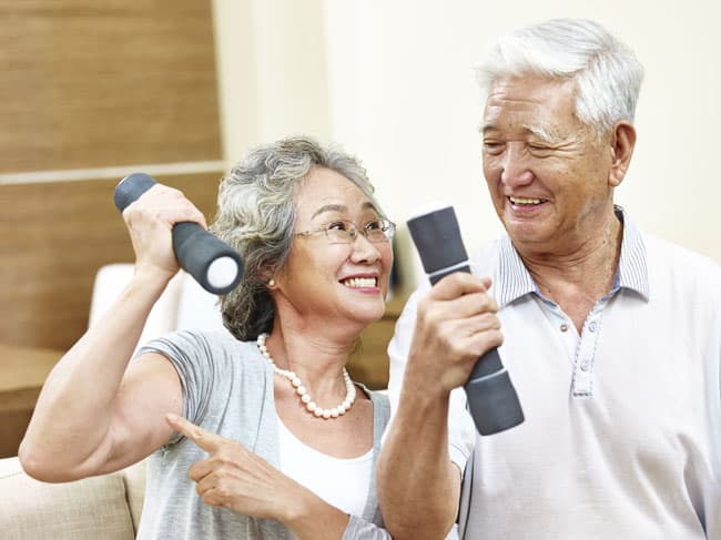 Asian couple in Kings Point gym Asian couple in Kings Point gym